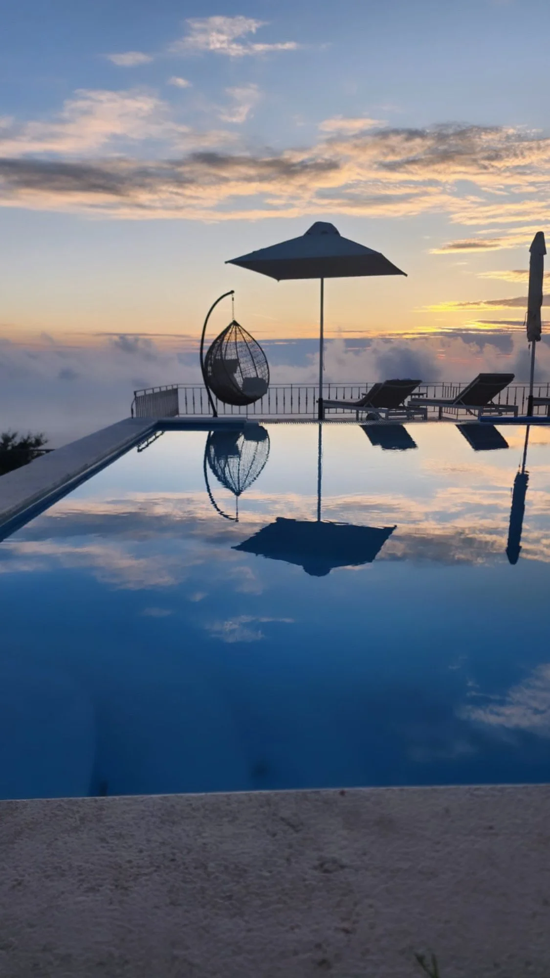 Evening view over the pool at Carmel Villas